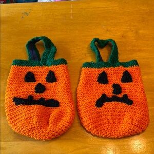 Adorable homemade Jack-O-Lantern crocheted trick-or-treat bags. Set of 2.